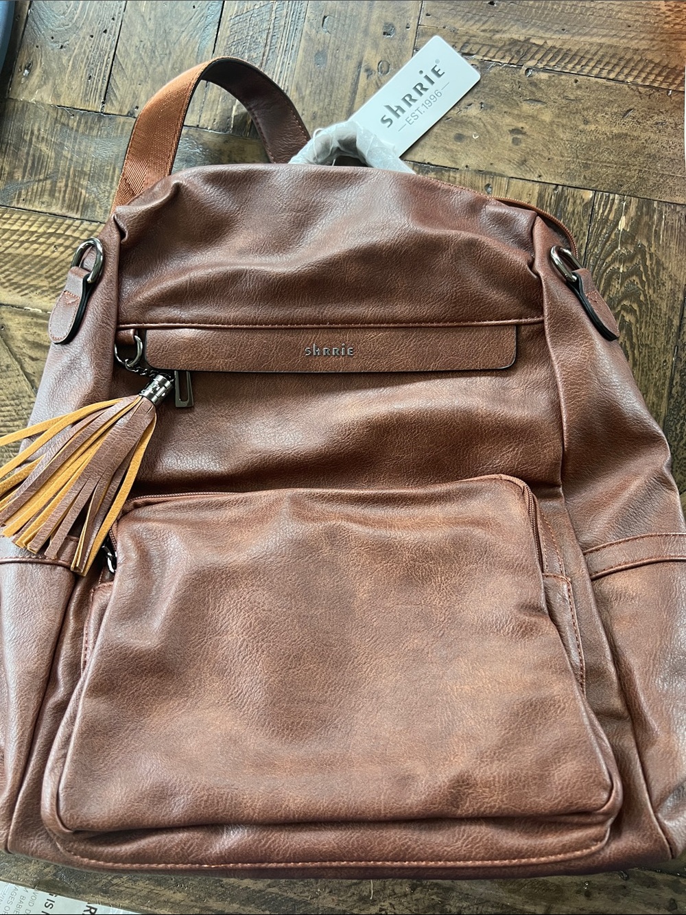 Amazon Brown Faux Leather Backpack with Tassel Accent